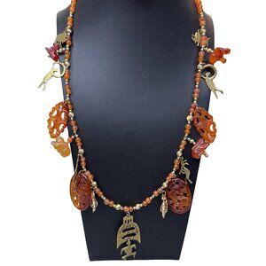 Brutalist Nancy NJ Young Kokopelli Tribal Carved Carnelian Bronze Charm Necklace